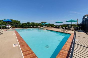 Swimming pool with umbrellas